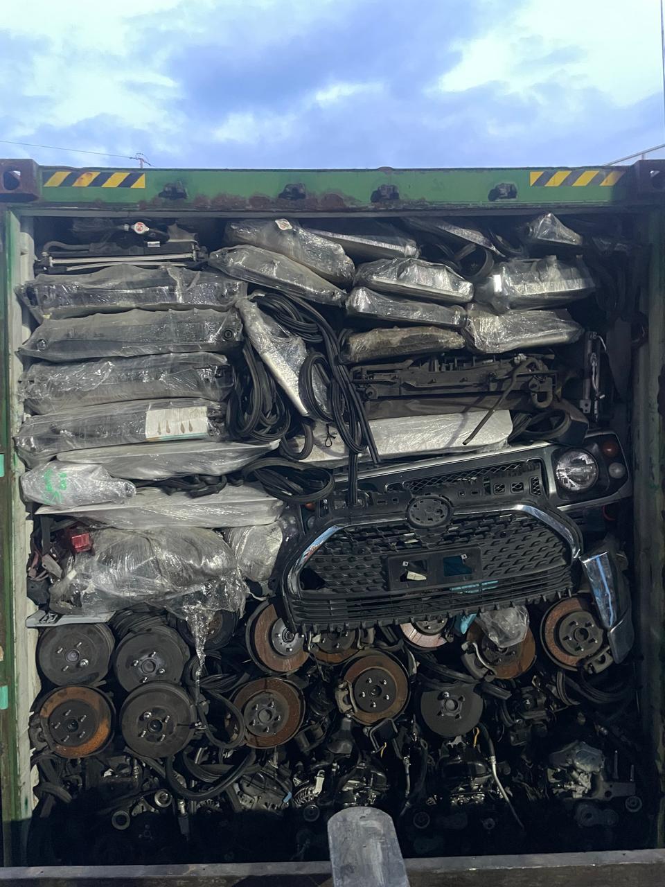 Mixed-cargo wall, radiators, grilles, brake assemblies