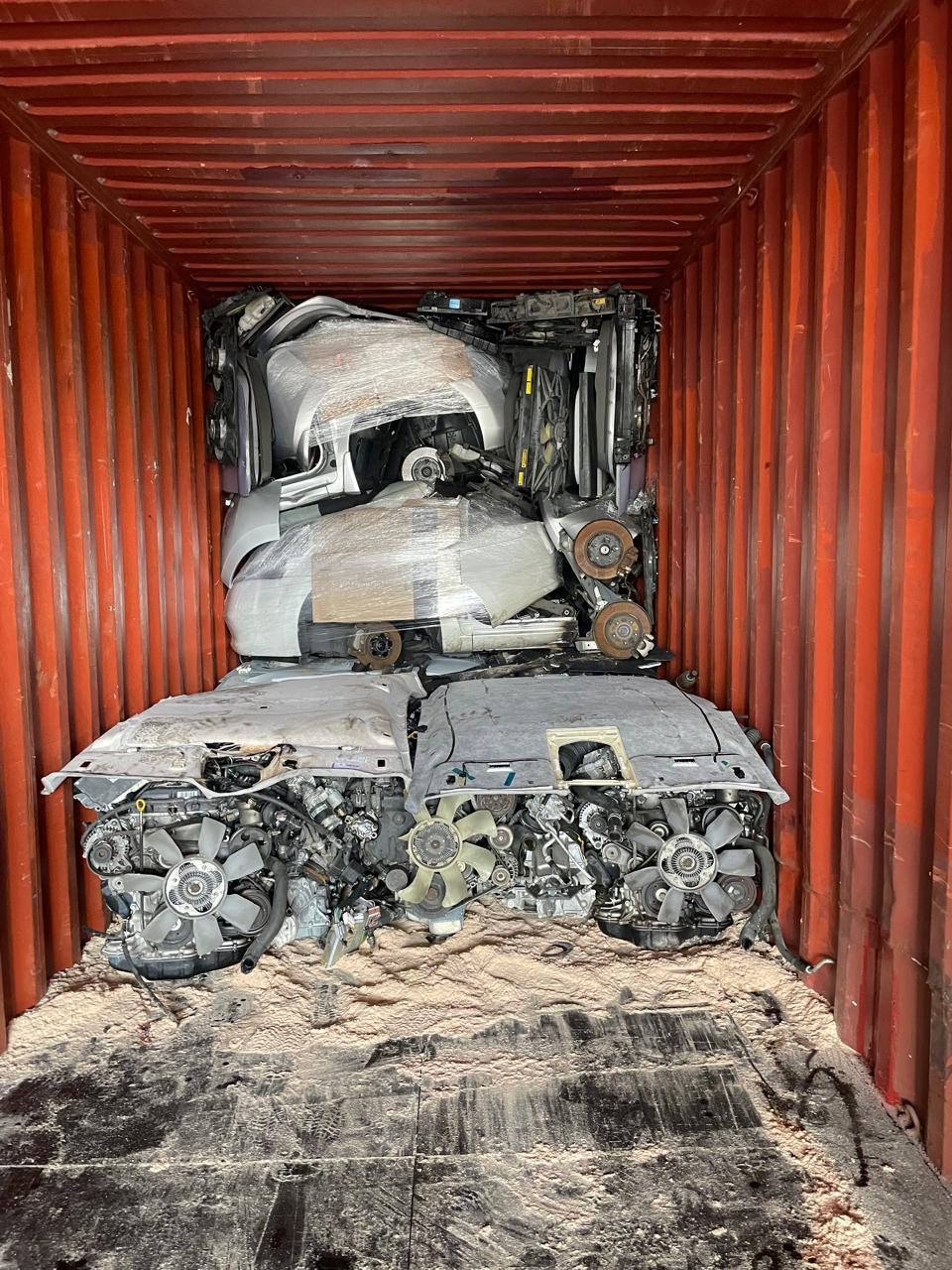 Engine bay with wrapped half-cut bodies stacked above