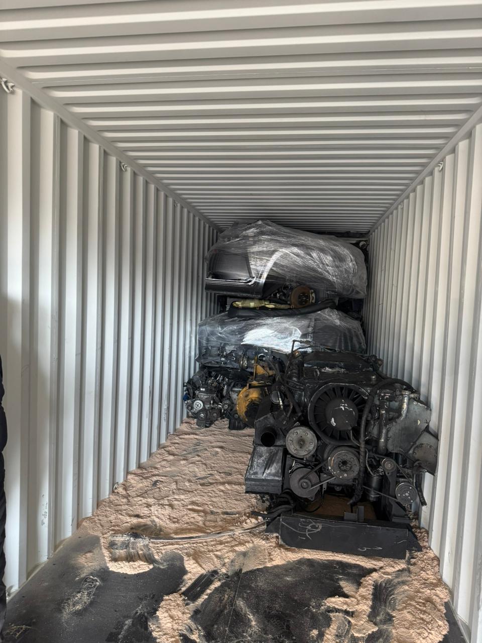 Heavy diesel engines on shavings, staged for build-up