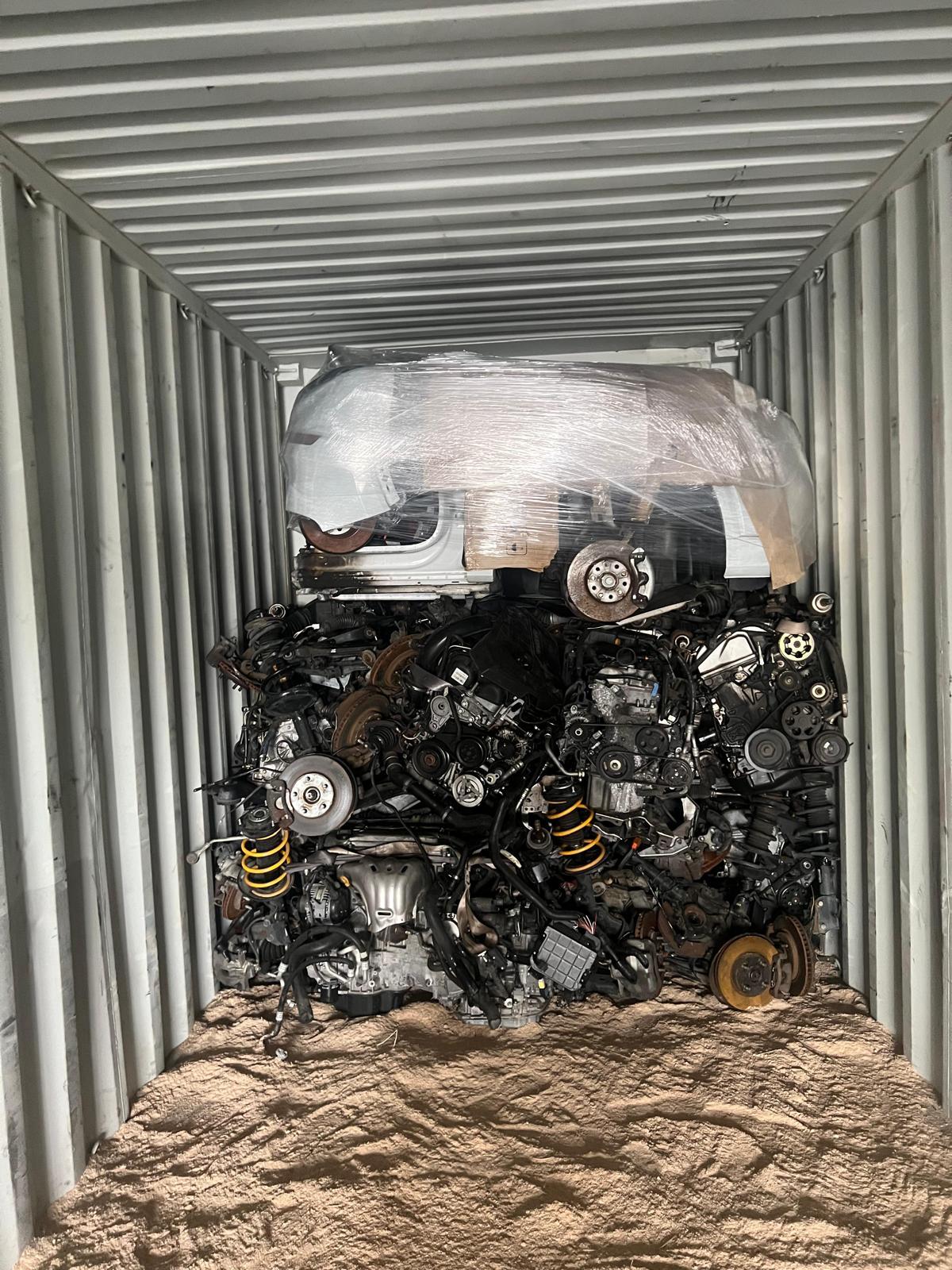 Wrapped half-cut shell stacked over engine wall