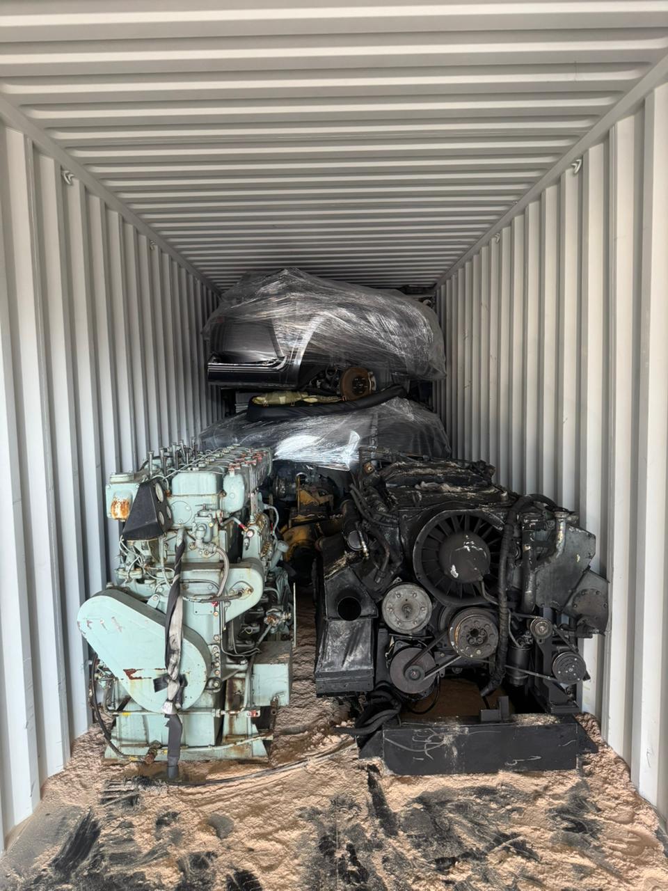 Heavy marine and truck diesel engines wrapped on shavings