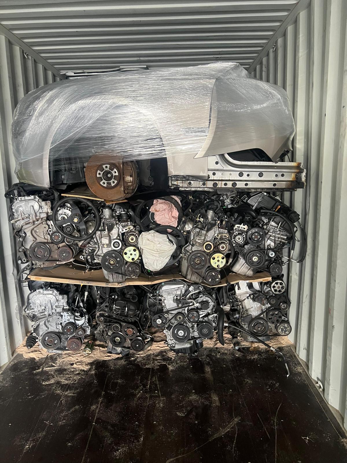 Two-tier engine wall with wrapped front clip above